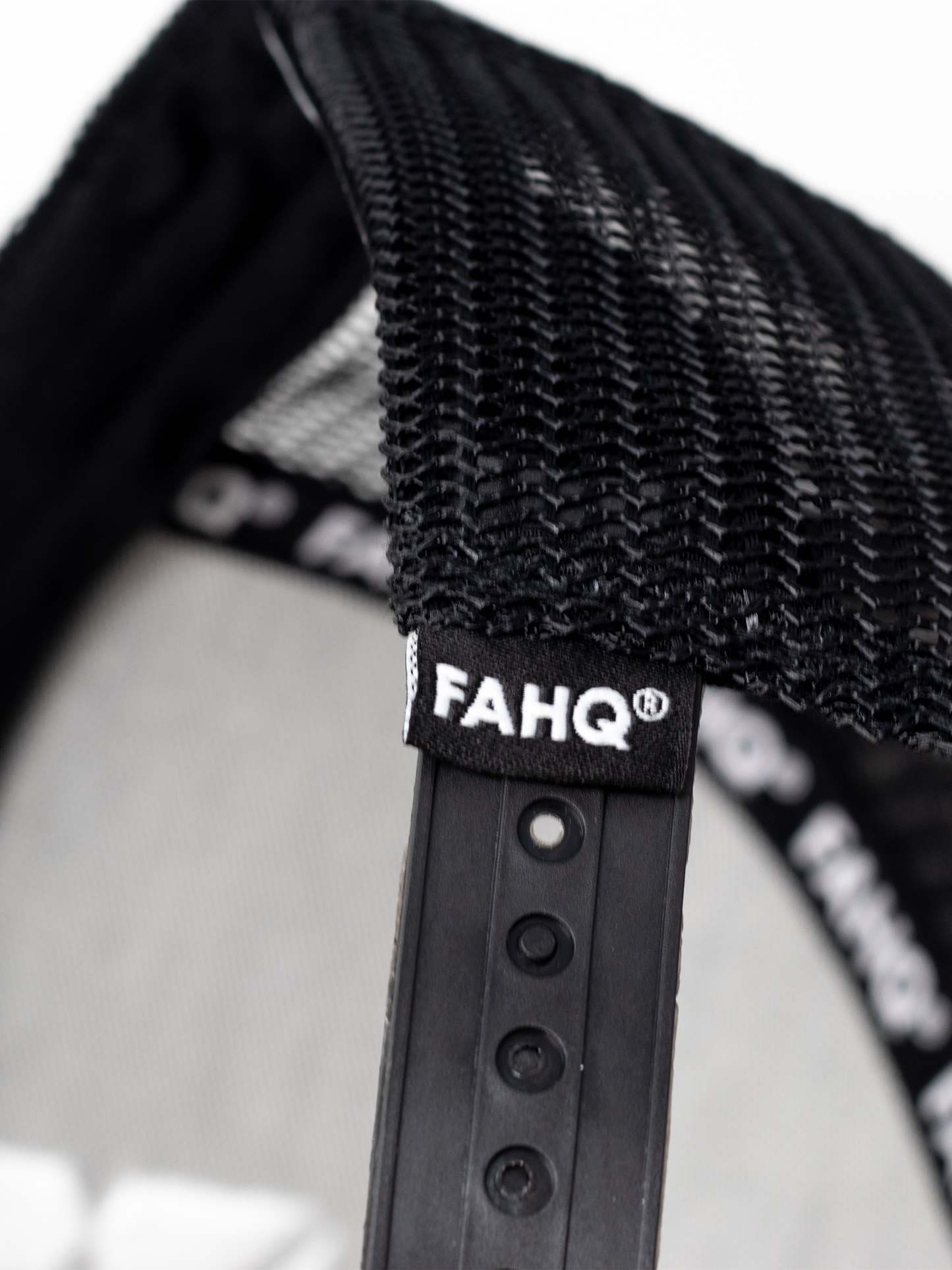 FAHQ Icon Trucker Hat Strap Tag